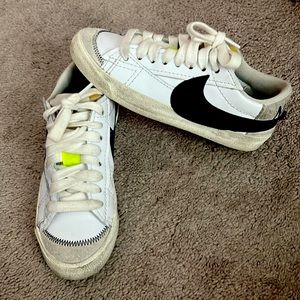 Heavily worn Nike Blazer Sneakers